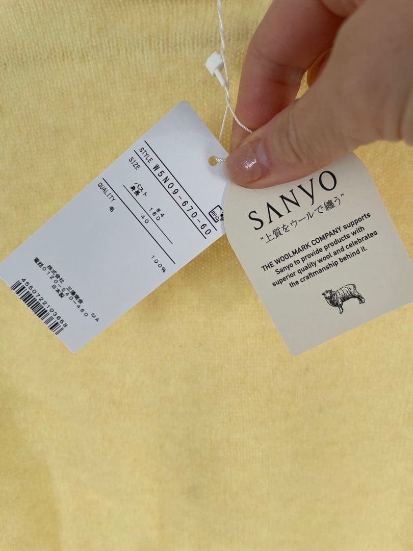 TOBECHOCイエロー ニットセーター 長袖 リボンモチーフパフスリーブ