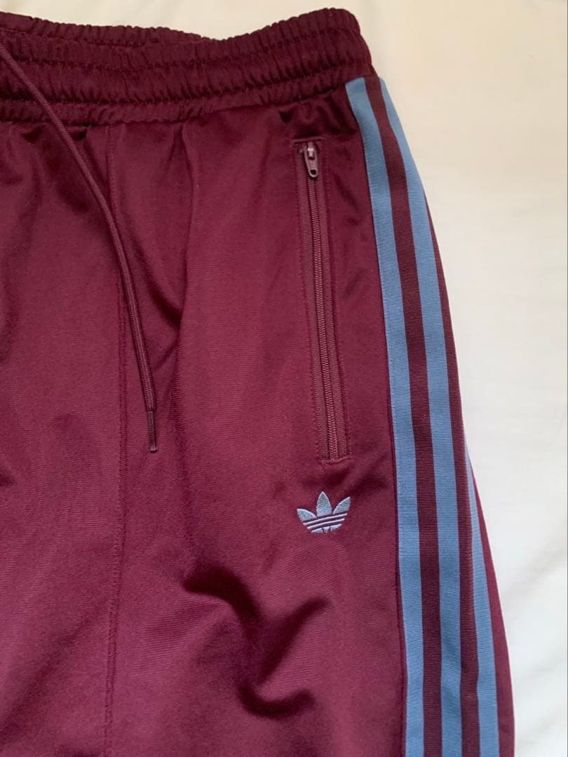 adidas ベッケンバウアー ジェンダーニュートラル トラックパンツ マルーン