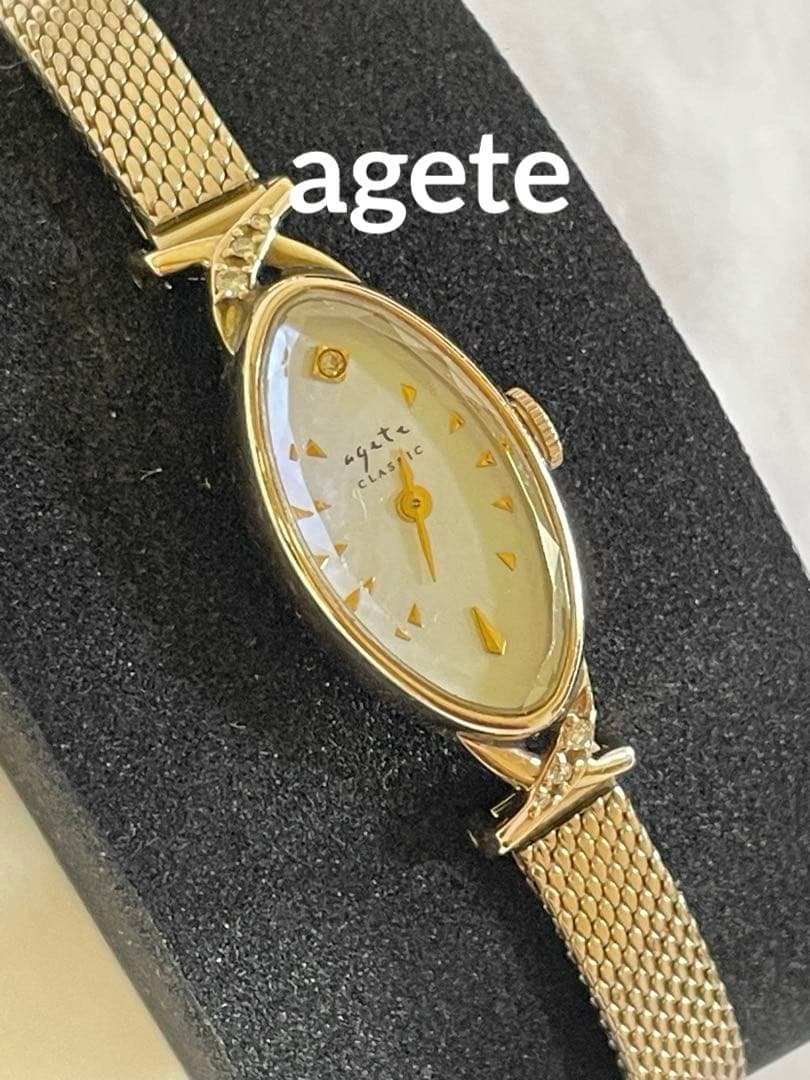 agete アガット　オーバルフェイス　ジュエリーウォッチ　ダイヤ　シェル