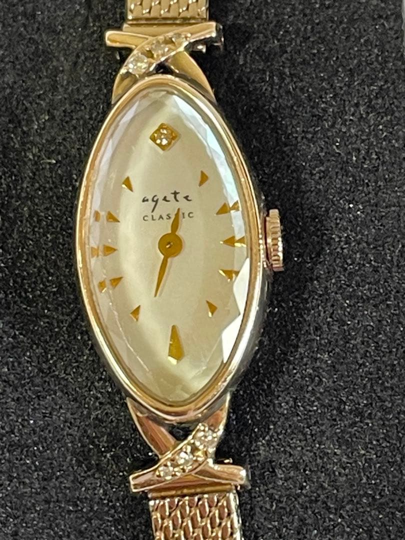 agete アガット　オーバルフェイス　ジュエリーウォッチ　ダイヤ　シェル