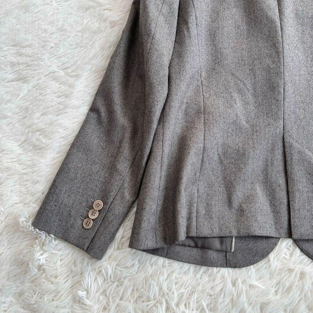 美品 ユニバーサルランゲージ カノニコ SUPER110パンツスーツセット XL