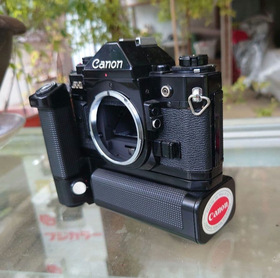 CanonA-1 フィルムカメラ　モータードライブ　シグマ16mmレンズ付き