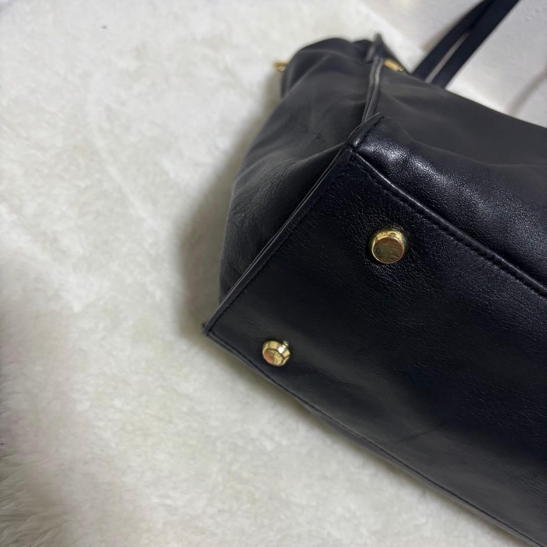 TUMI ニーナ ノースサウス トートバッグ レザー ブラック A4 ゴールド