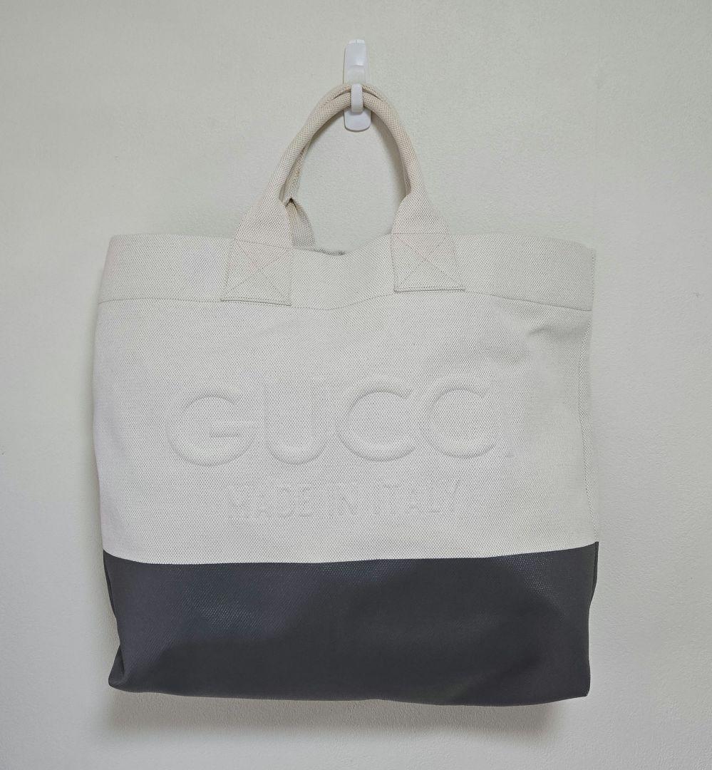 か*ぺ様 GUCCI グッチ エンボスロゴ キャンバス トート ショルダーバッグ