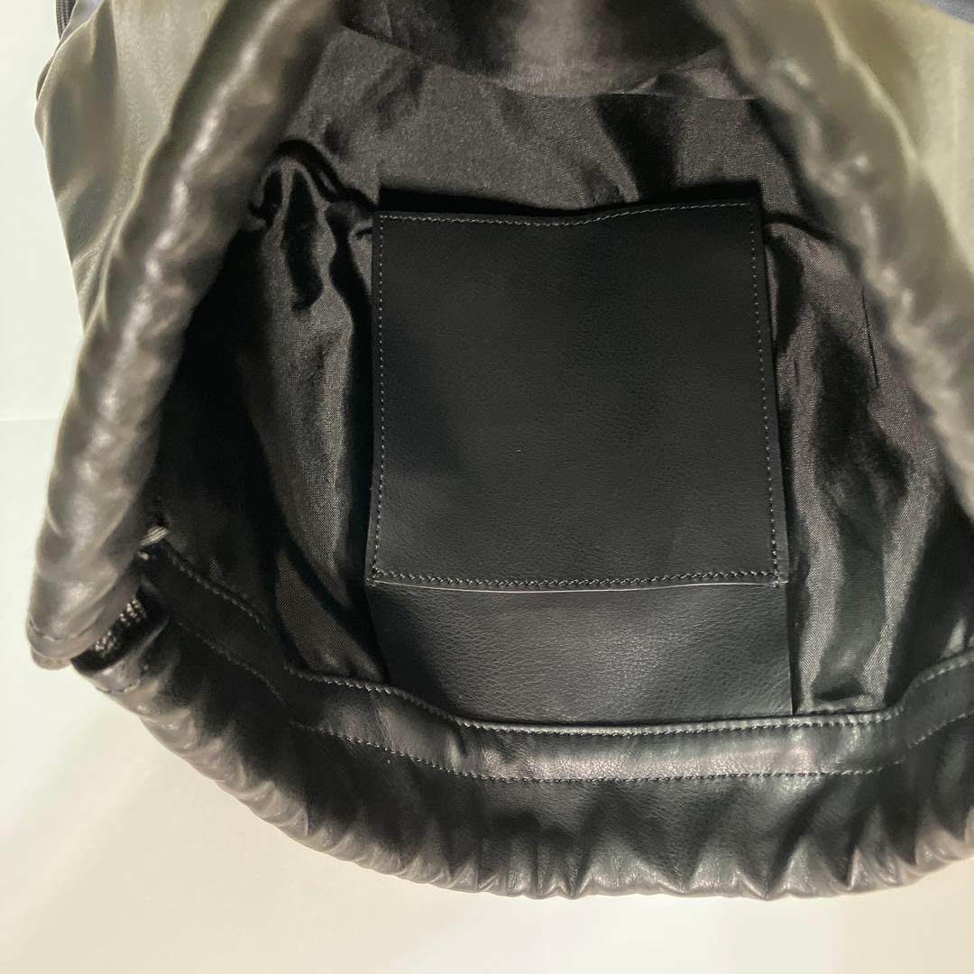 バッグ UNION Magazine backPack M's black swan