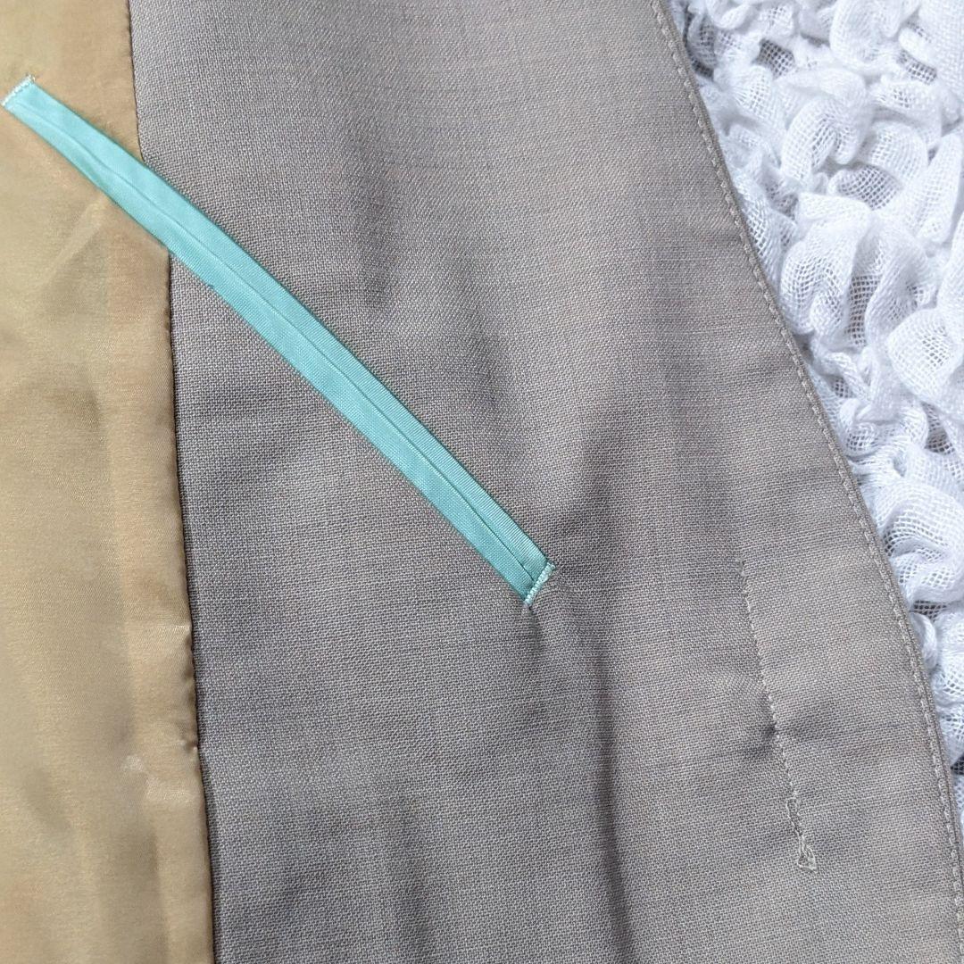 グリーンレーベルリラクシング セットアップ パンツスーツ カチリラ ノーカラー