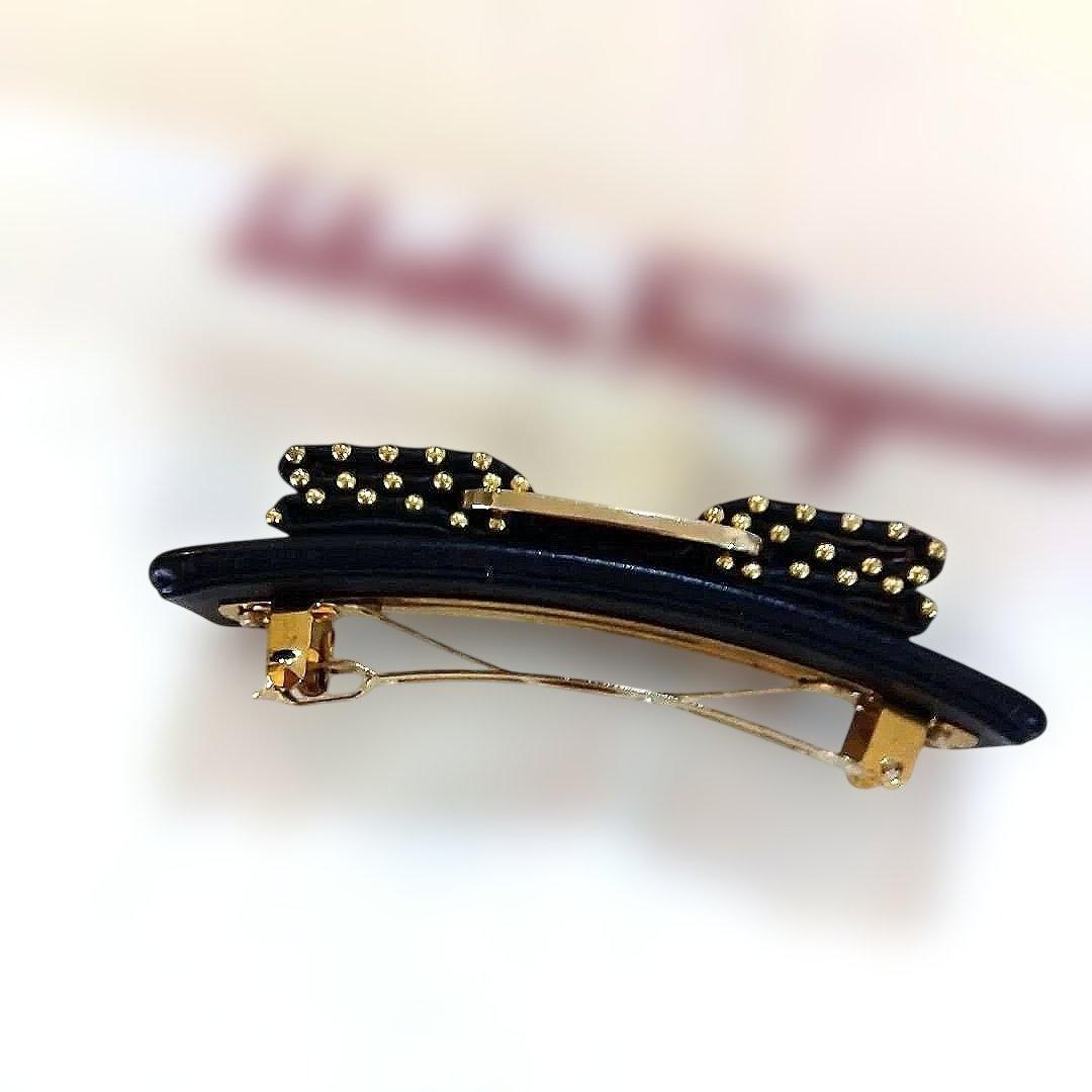 サルバトーレ・フェラガモ　 リボン型ヘアクリップ 黒金