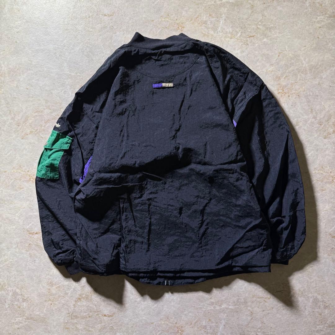 90s adidasナイロンジャケットL万国旗銀タグ CBOYクレイジーパターン