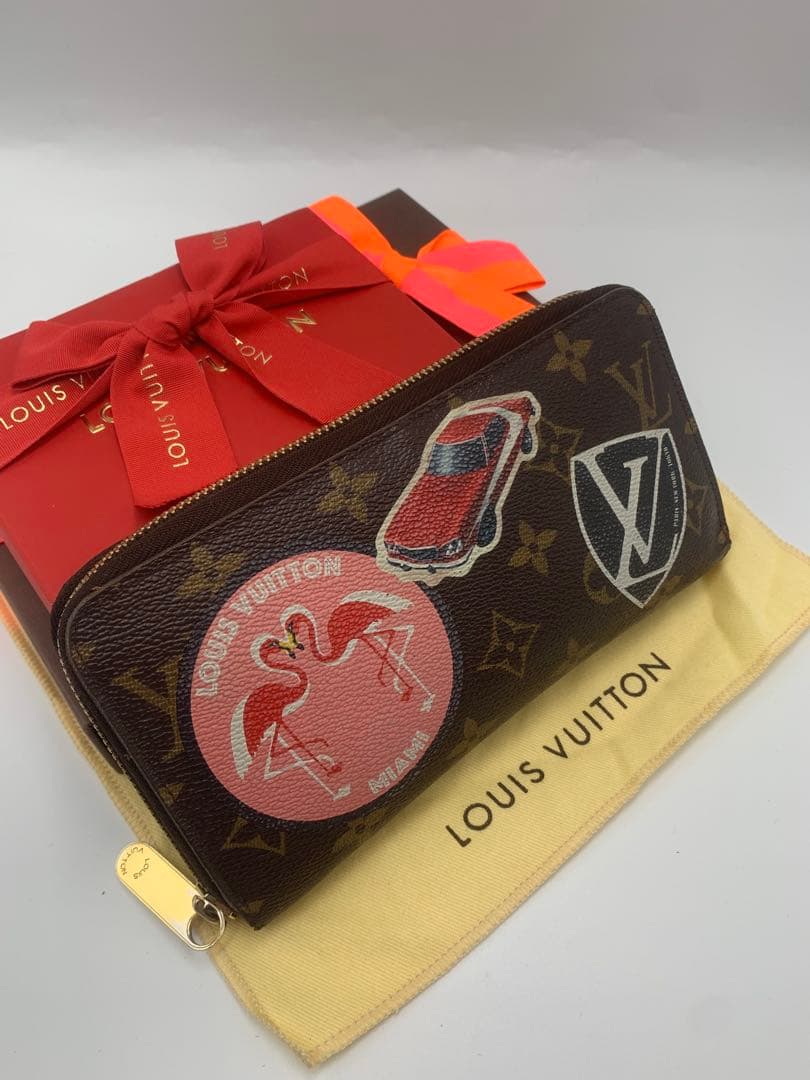 ルイヴィトン モノグラム ステッカー ジッピーウォレットコクリコ 長財布 P55