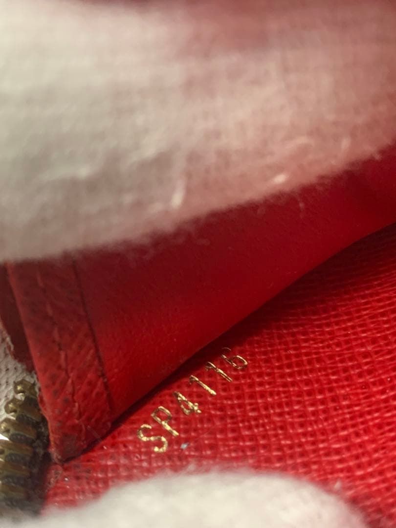 ルイヴィトン モノグラム ステッカー ジッピーウォレットコクリコ 長財布 P55