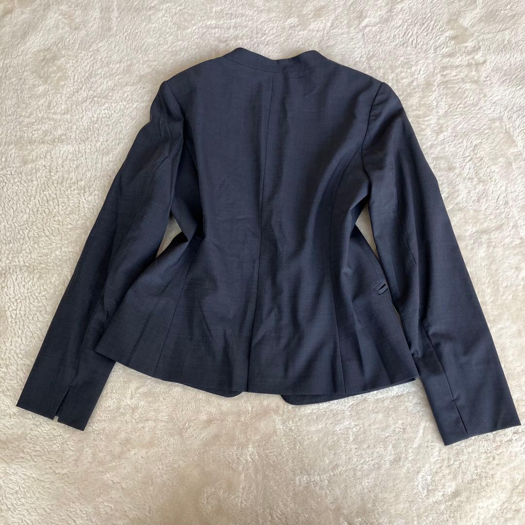 グリーンレーベルリラクシング ノーカラー パンツ スーツ ネイビー 38 総裏