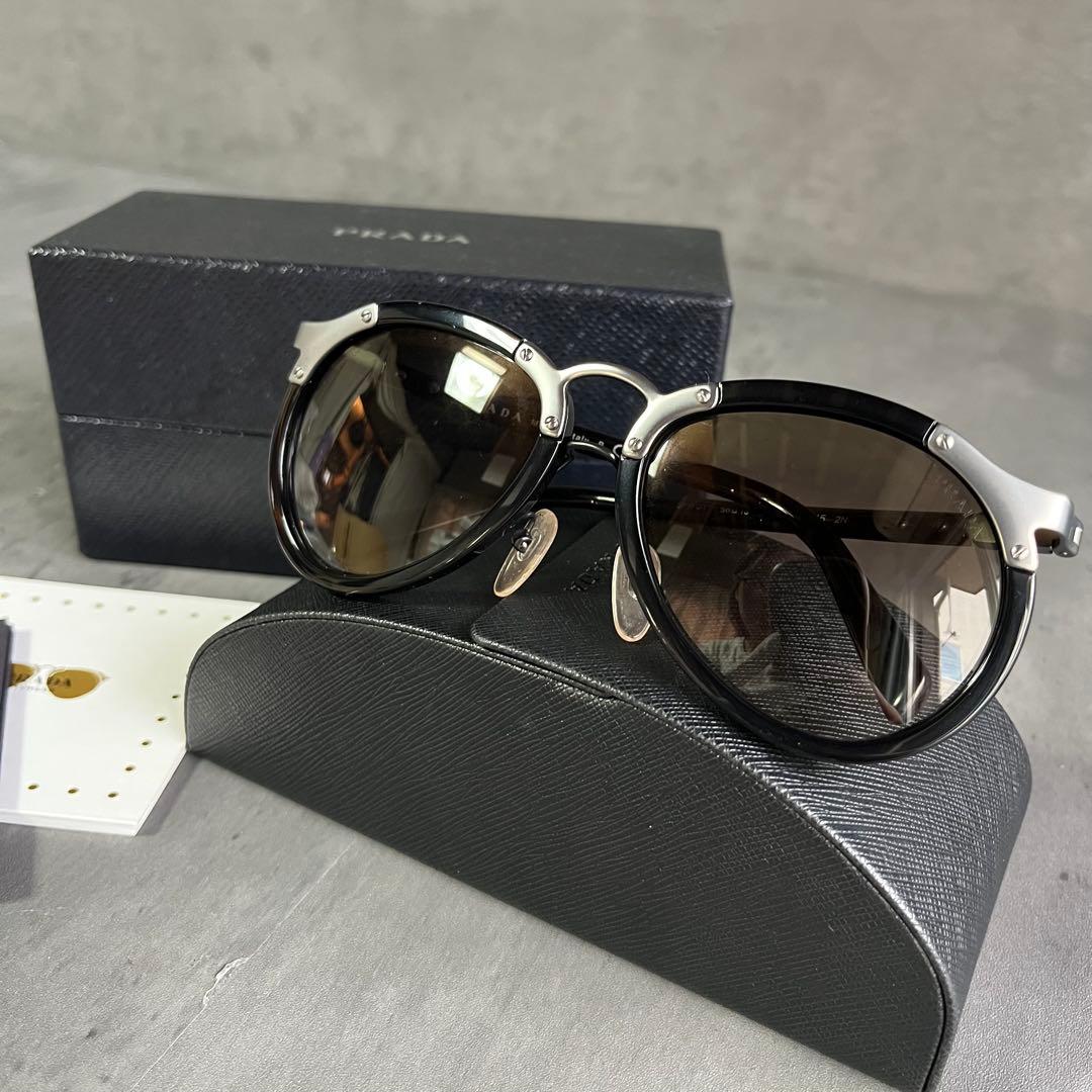 PRADA（プラダ）サングラス OPR 01TS 黒　ブラック