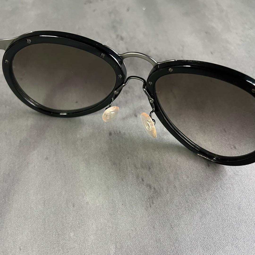 PRADA（プラダ）サングラス OPR 01TS 黒　ブラック