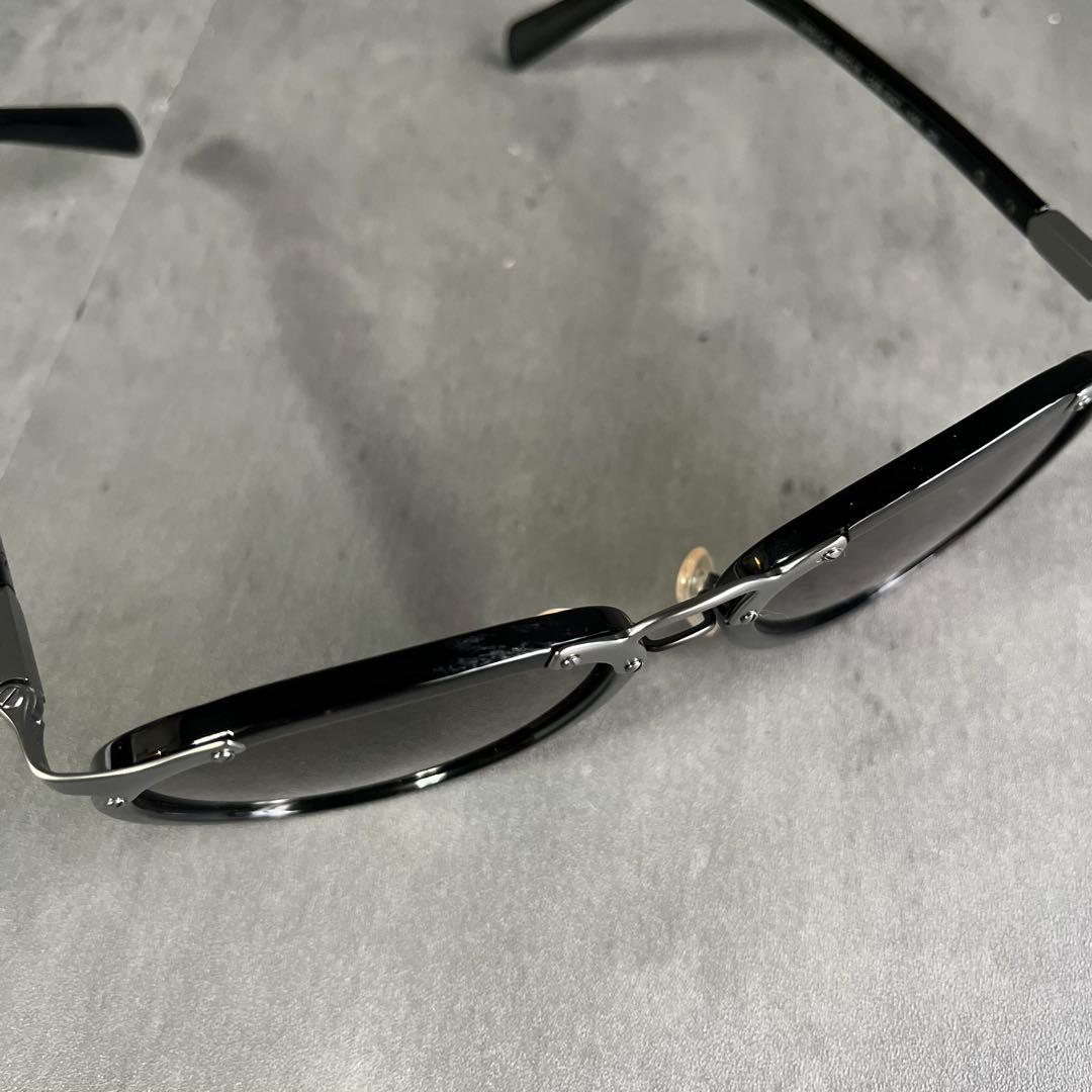 PRADA（プラダ）サングラス OPR 01TS 黒　ブラック