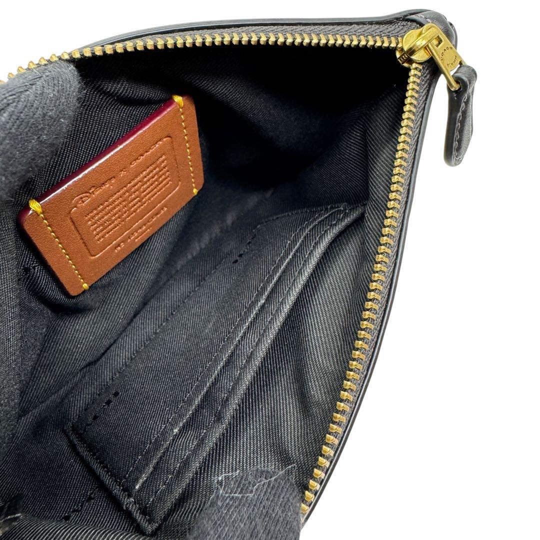 極美品 コーチ ポーチ ディズニーコラボ プルート ブラック 現行