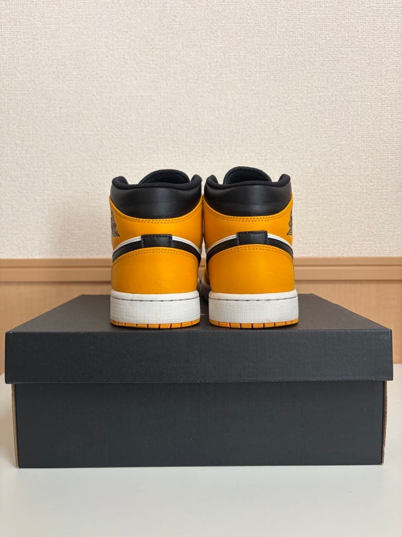 ナイキ エアジョーダン1ミッド タクシー/ブラックホワイト 554724-701