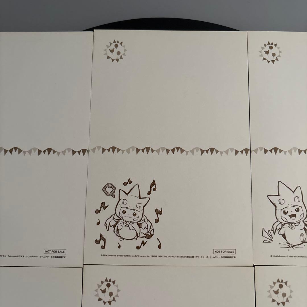 非売品　メガリザードンYのポンチョに身を包んだピカチュウ ポストカード　ポケモン