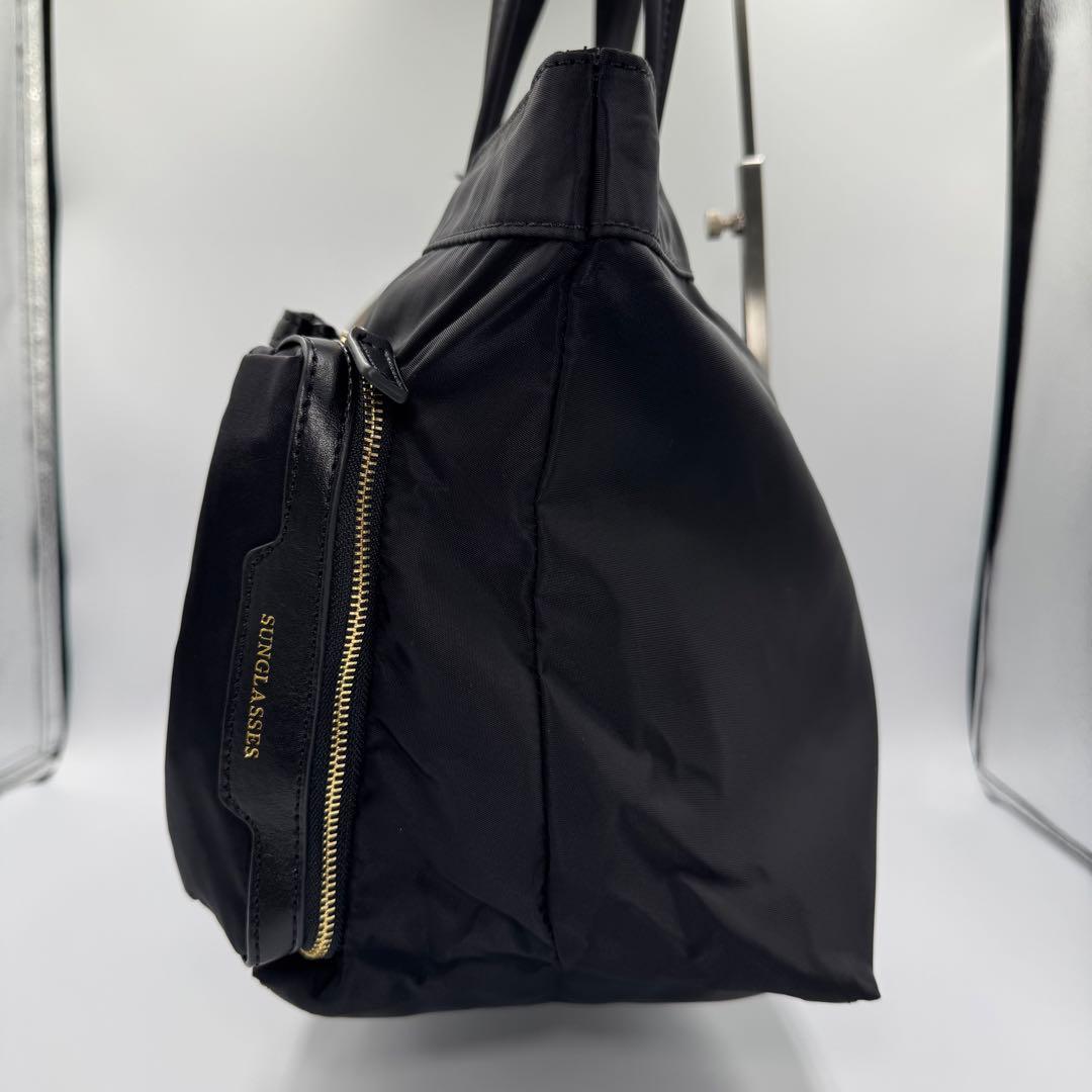 アニヤハインドマーチ ブラックトートバッグ サングラスポケット付き