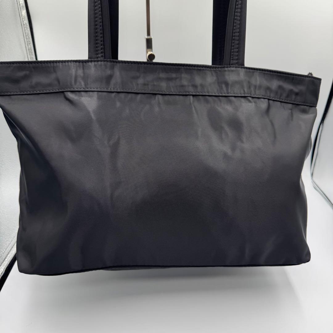 アニヤハインドマーチ ブラックトートバッグ サングラスポケット付き