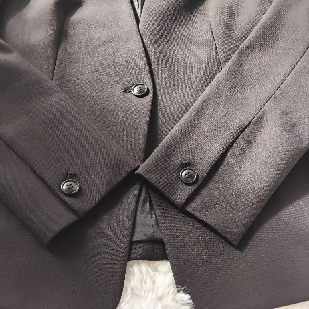 プラステ　パンツスーツ　ノーカラー　セットアップ　洗える　ストレッチ　黒　L