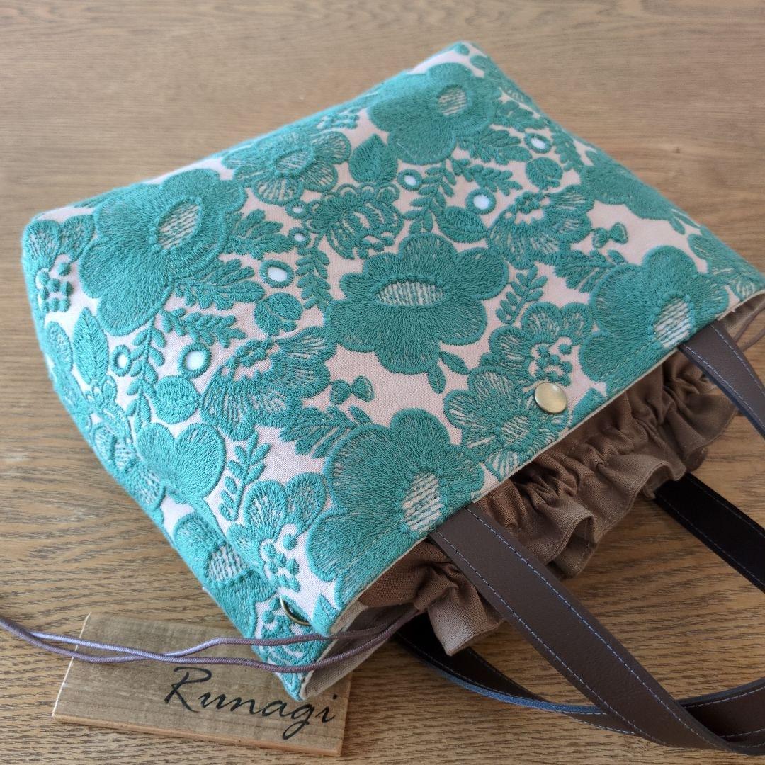 【1570】あおりポケットの巾着バッグ＊ミナペルホネン