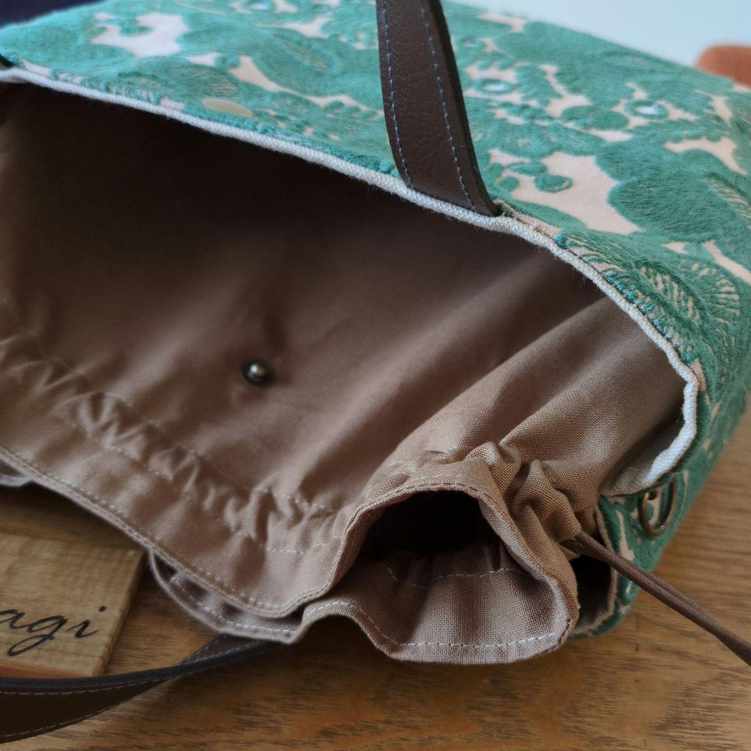 【1570】あおりポケットの巾着バッグ＊ミナペルホネン