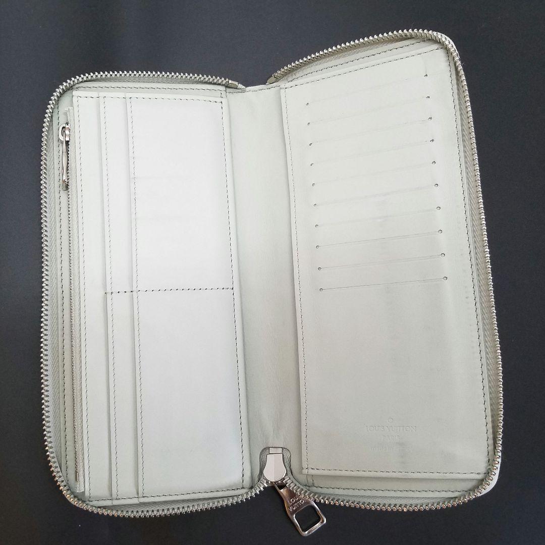 ルイヴィトン トリヨンレザー ヴェルティカル ジッピーウォレット ミネラルグレー