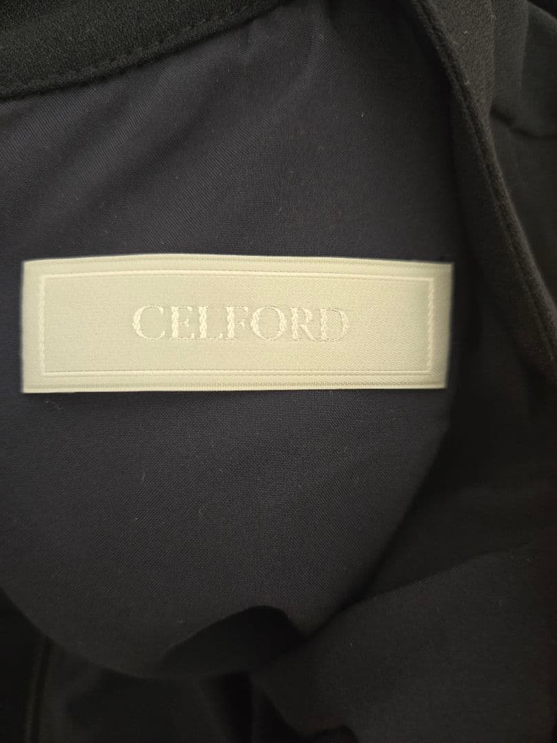 セルフォードボウタイプリーツワンピース　ネイビー