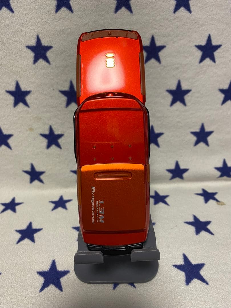 SO505iS オレンジ 回転式 携帯電話