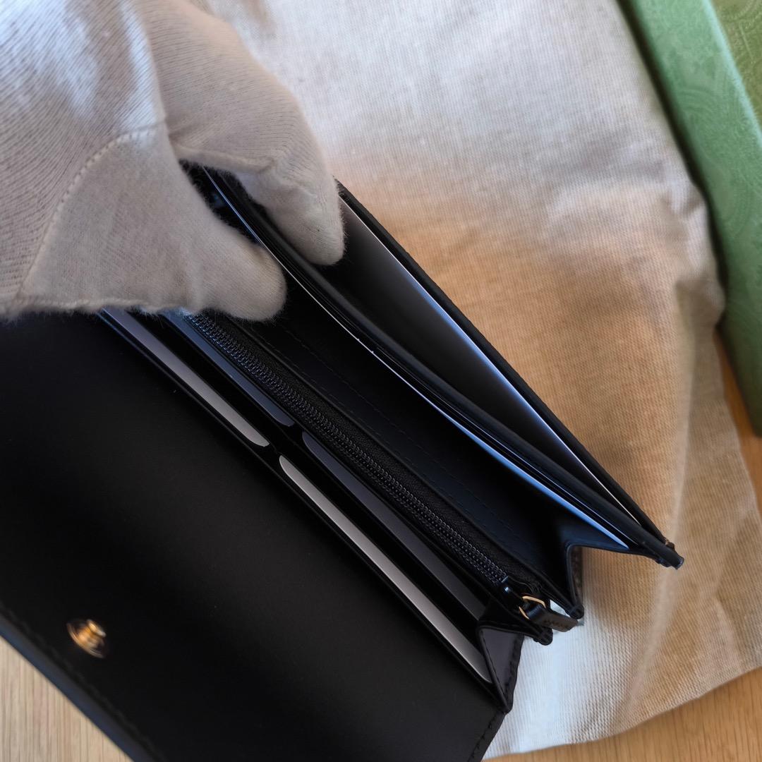 新品未使用！Gucci 人気 GGスプリーム ユニセックス 二つ折り長財布