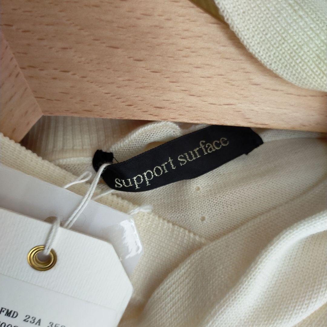 新品未使用 サポートサーフェス フロントクロスハイネックニット