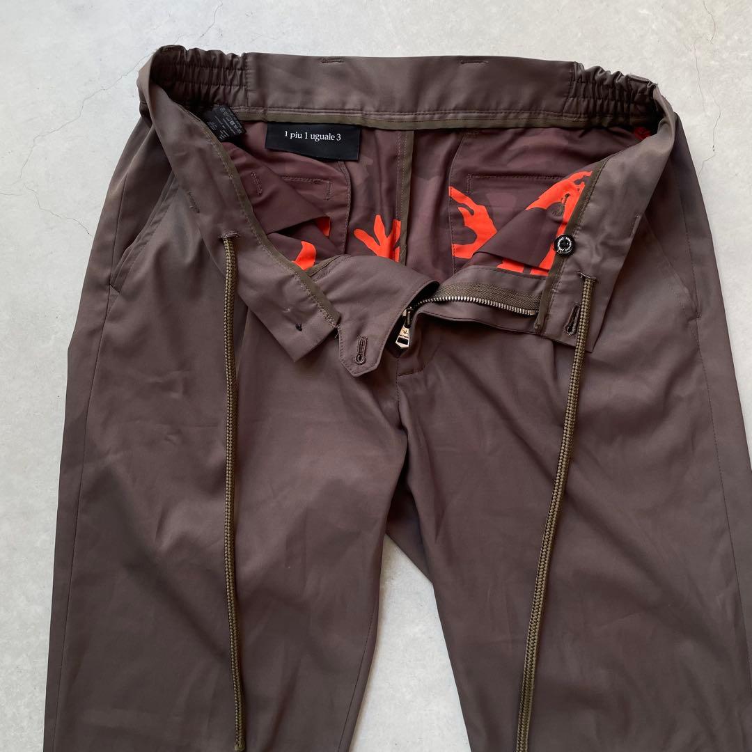 1PIU1UGUALE3 ウノピゥウノウグァーレトレ ロングパンツ メンズM