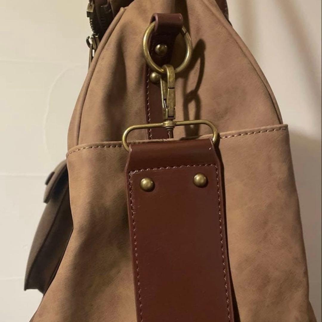 TINA：JOJUN ショルダー付き トラベルバッグ