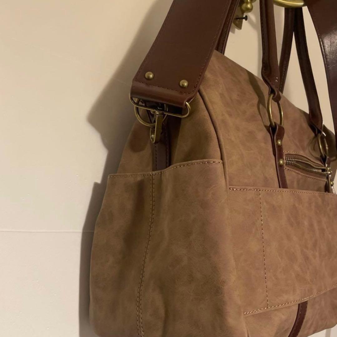 TINA：JOJUN ショルダー付き トラベルバッグ