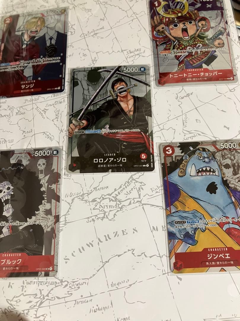 ワンピースカード　プレミアムコレクション等7冊未開封プロモ付25周年REDリーダ