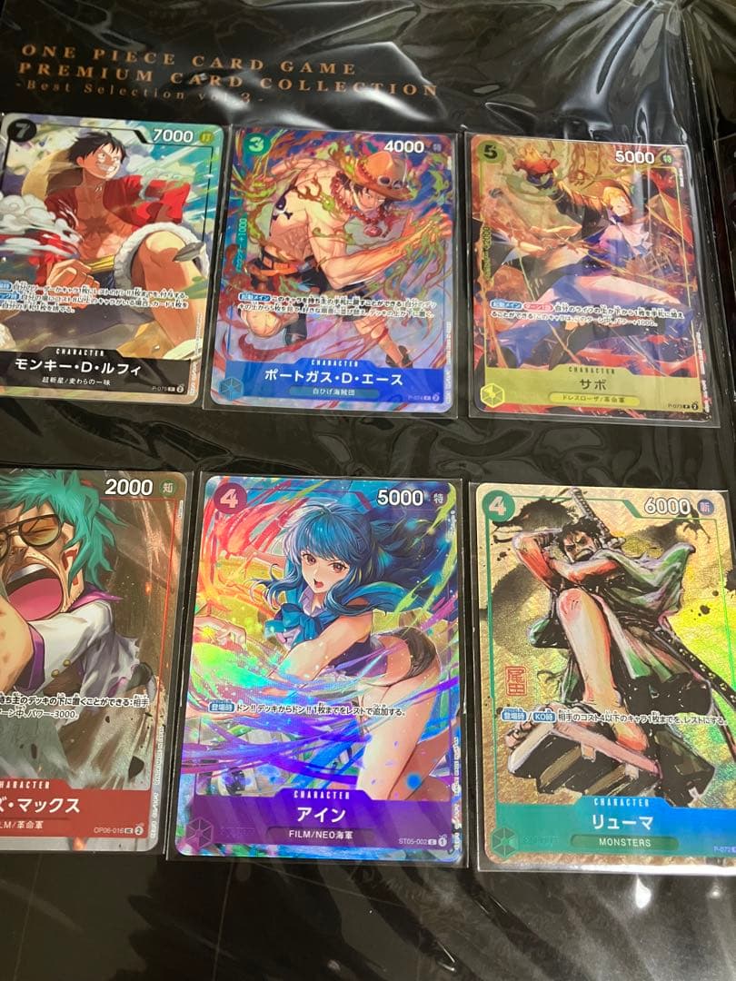 ワンピースカード　プレミアムコレクション等7冊未開封プロモ付25周年REDリーダ