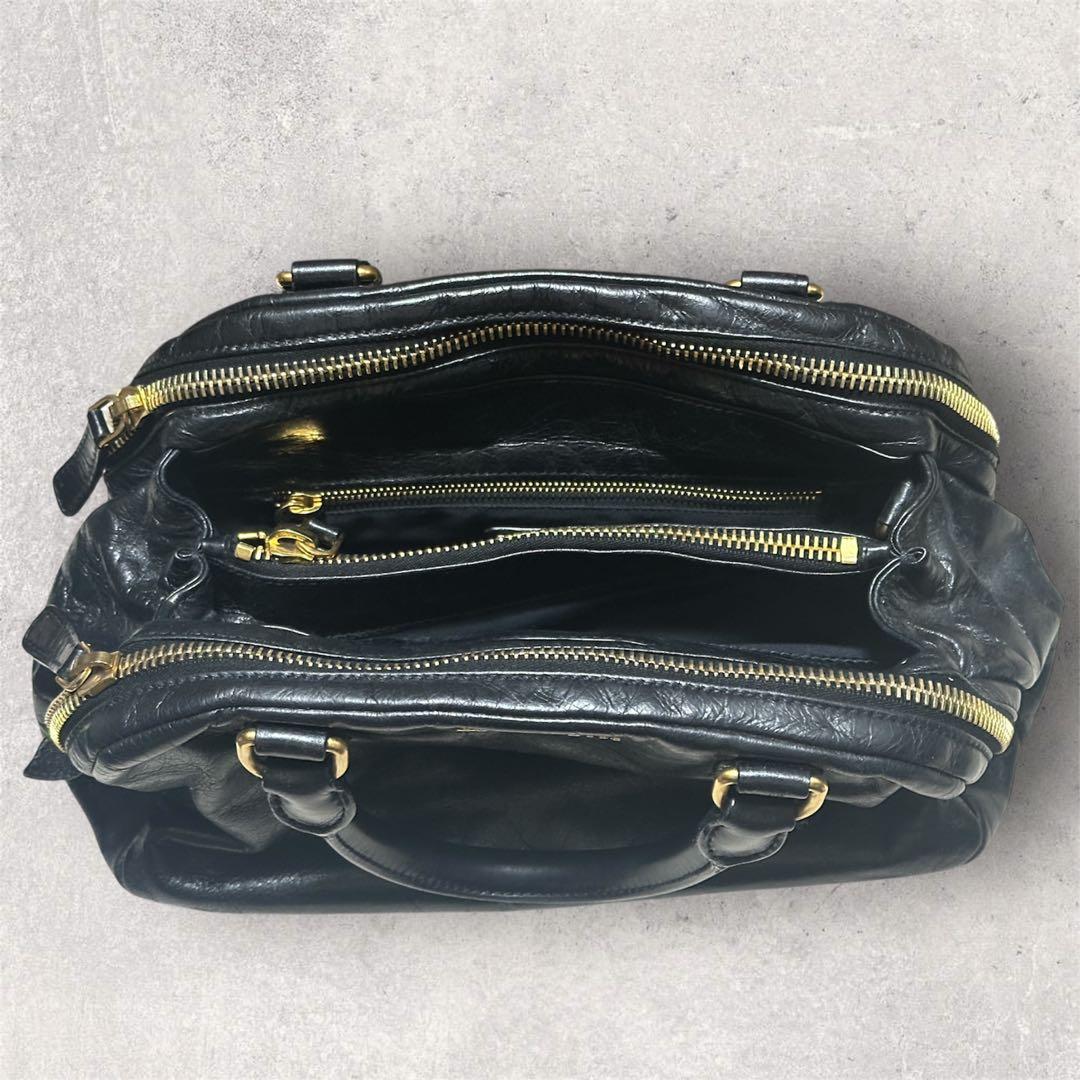 miu miu ブラック　ゴールド　レザー　ハンドバッグ