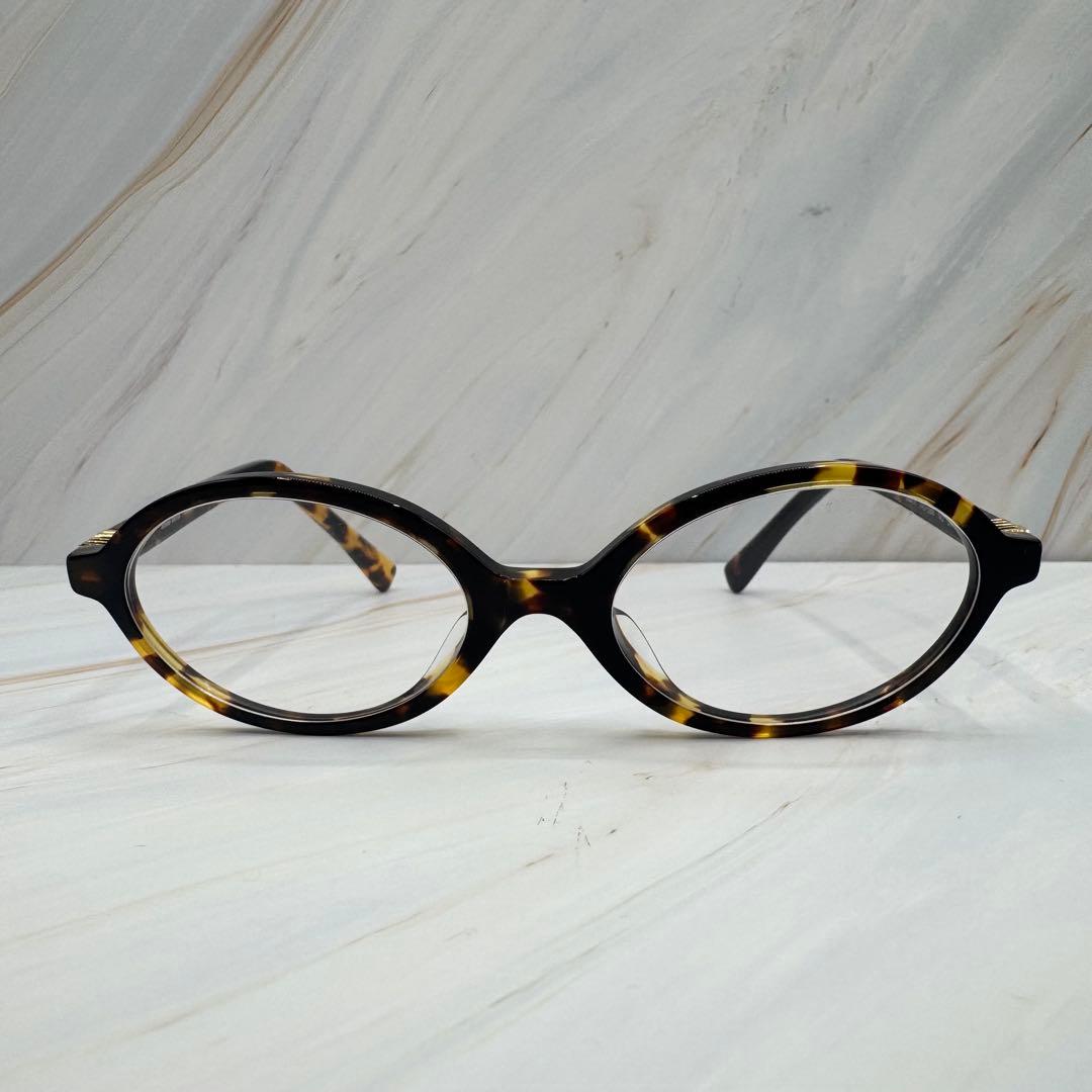 極美品【ミュウミュウ】ウォニョン着用　サングラス　べっこう柄　ケース付