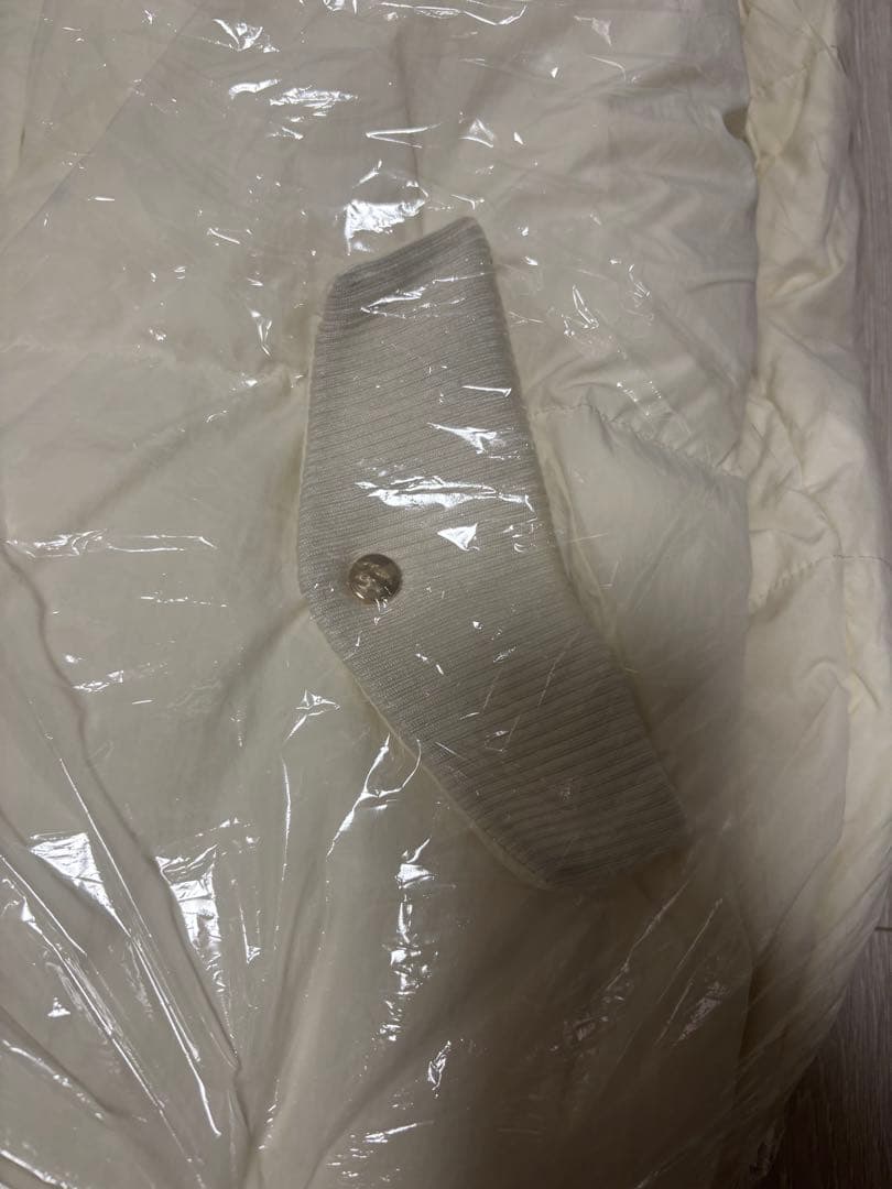 ポローラ　ドロストリボンダウンジャケット　アイボリー