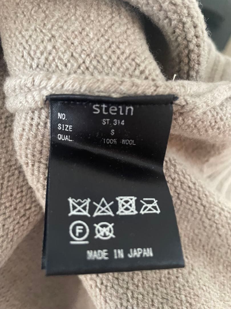 トップス OVERSIZED IMPRESSION HIGH NECK KNIT LS