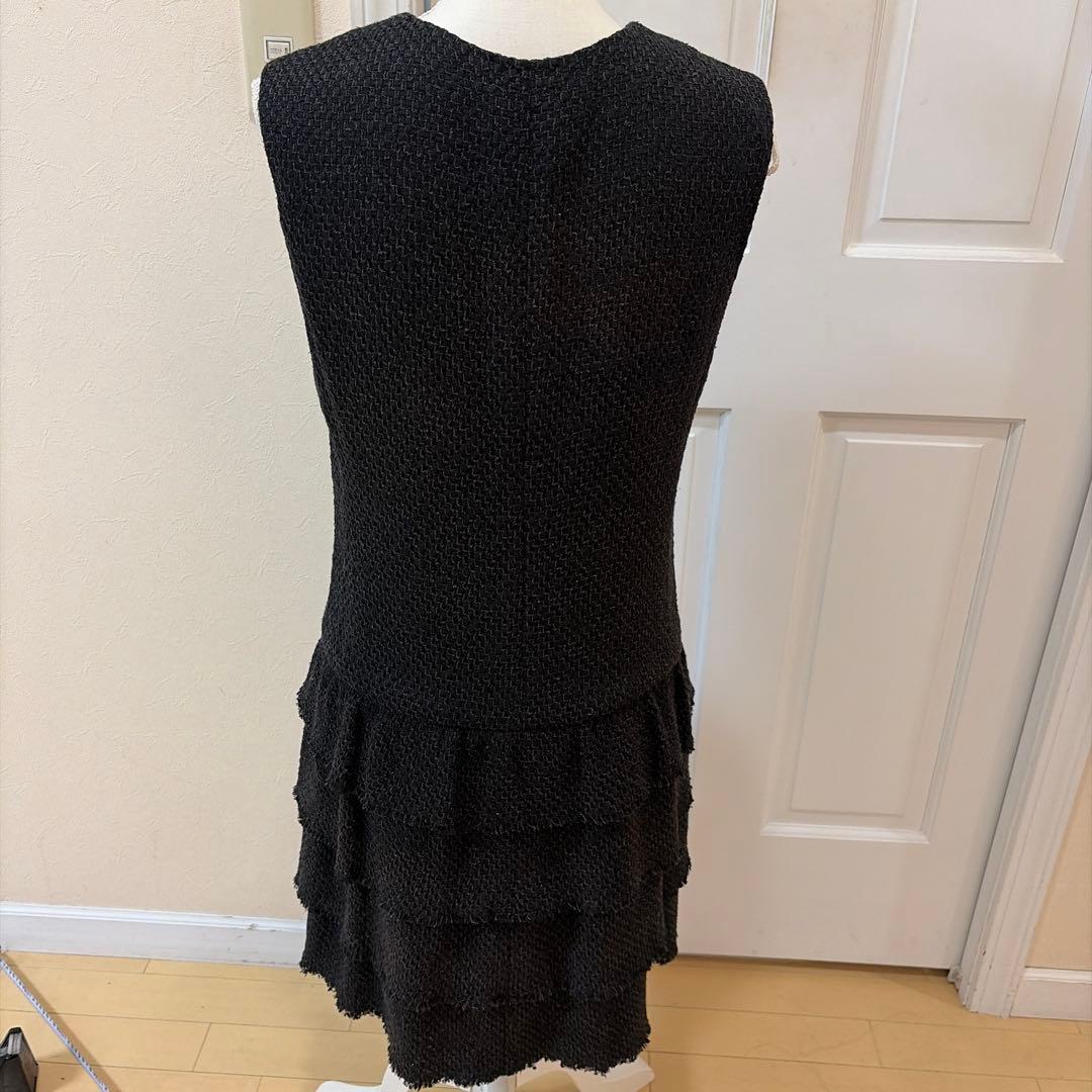 シャネルシャネル黒フリルワンピースサイズ42ツイード素材