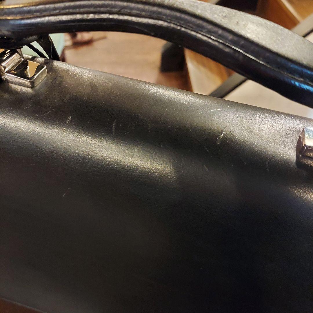 a*t様 ワイルドスワンズ ブリーフケース 15万円弱