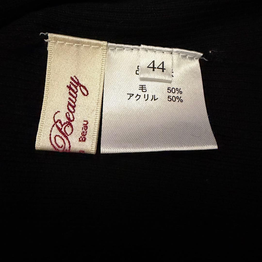 スーパービューティー新品未使用タートルネック袖口がリボン飾りでチャーミング