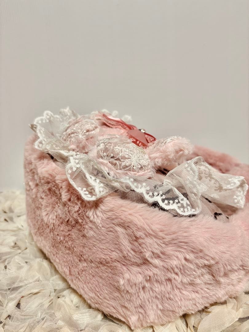 お取り置きです。コヤンイサムチョン　ピンクファのリボンゴブランころりんバッグ