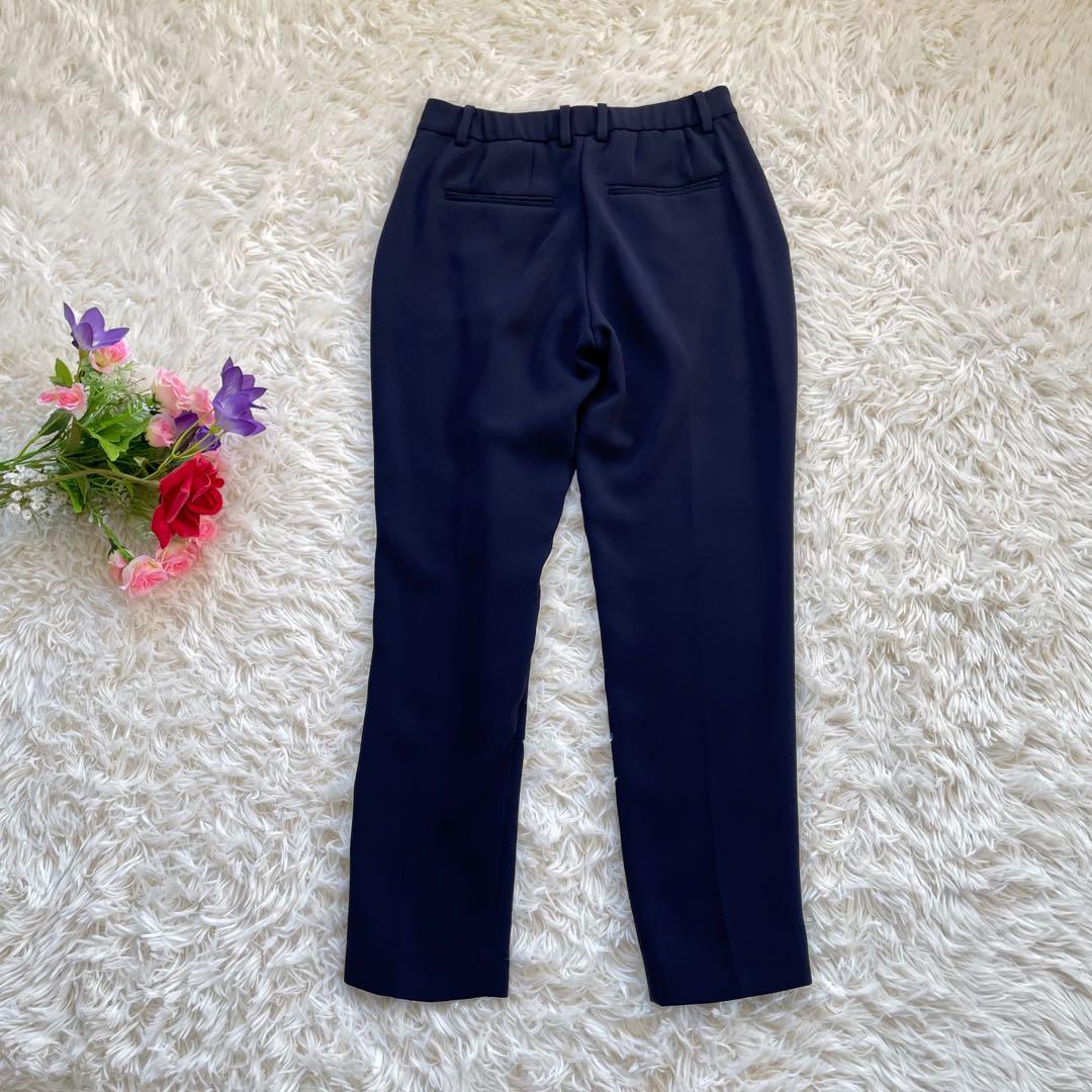 PLSTプラステ ネイビーノーカラージャケットパンツスーツセットアップ洗える