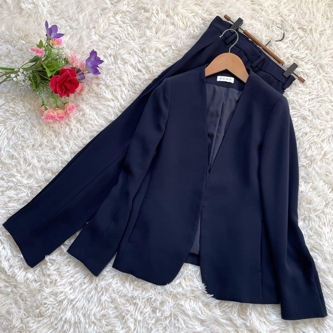 PLSTプラステ ネイビーノーカラージャケットパンツスーツセットアップ洗える