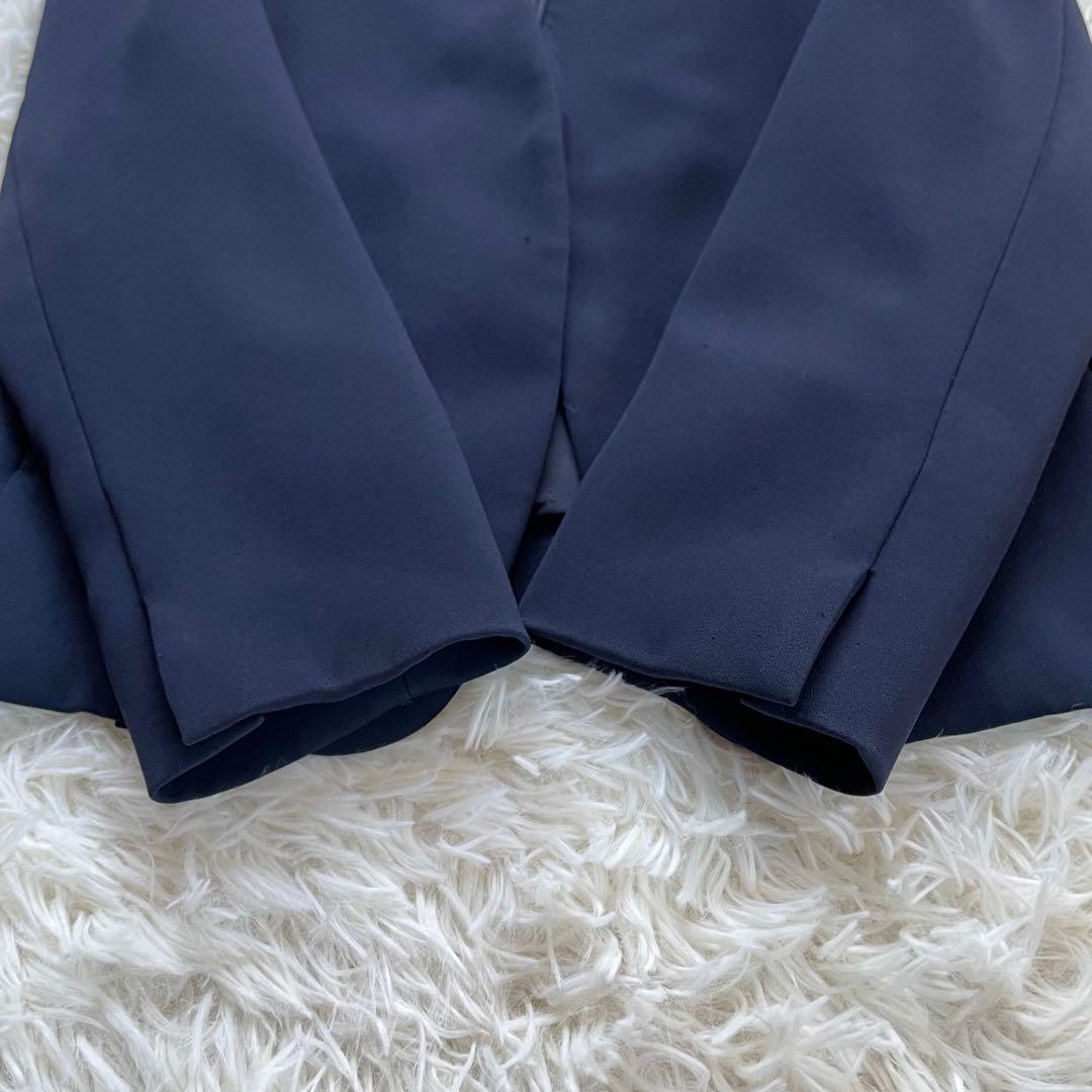 PLSTプラステ ネイビーノーカラージャケットパンツスーツセットアップ洗える