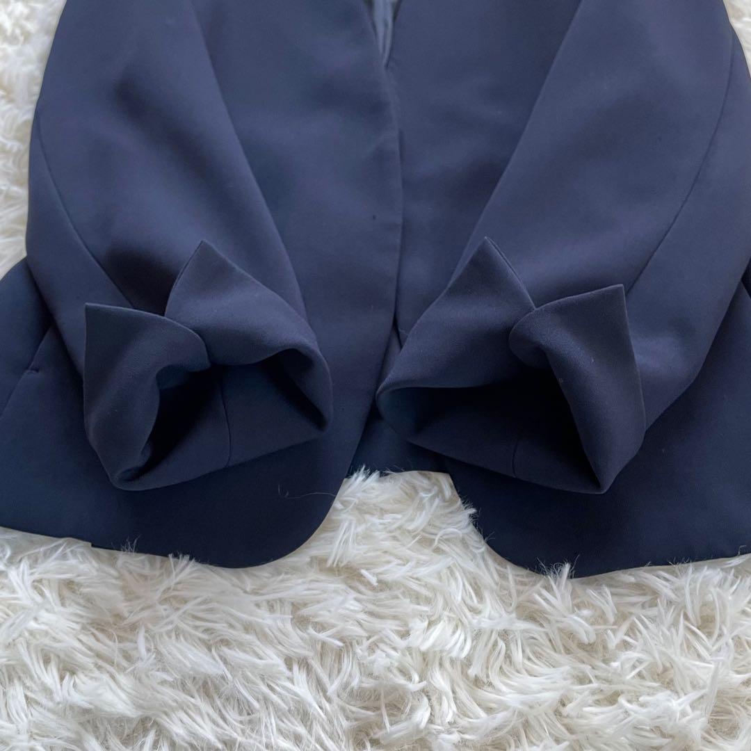 PLSTプラステ ネイビーノーカラージャケットパンツスーツセットアップ洗える