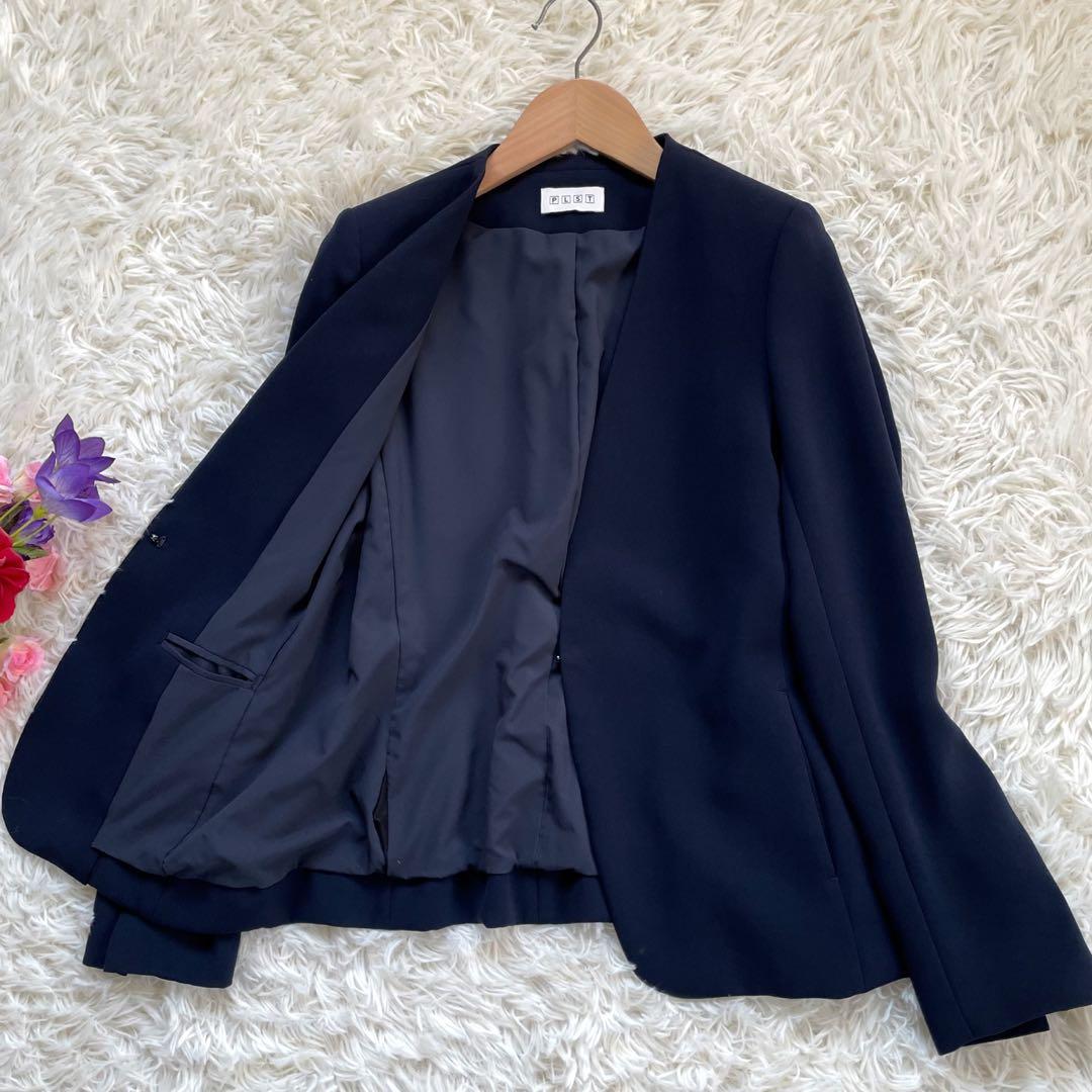 PLSTプラステ ネイビーノーカラージャケットパンツスーツセットアップ洗える