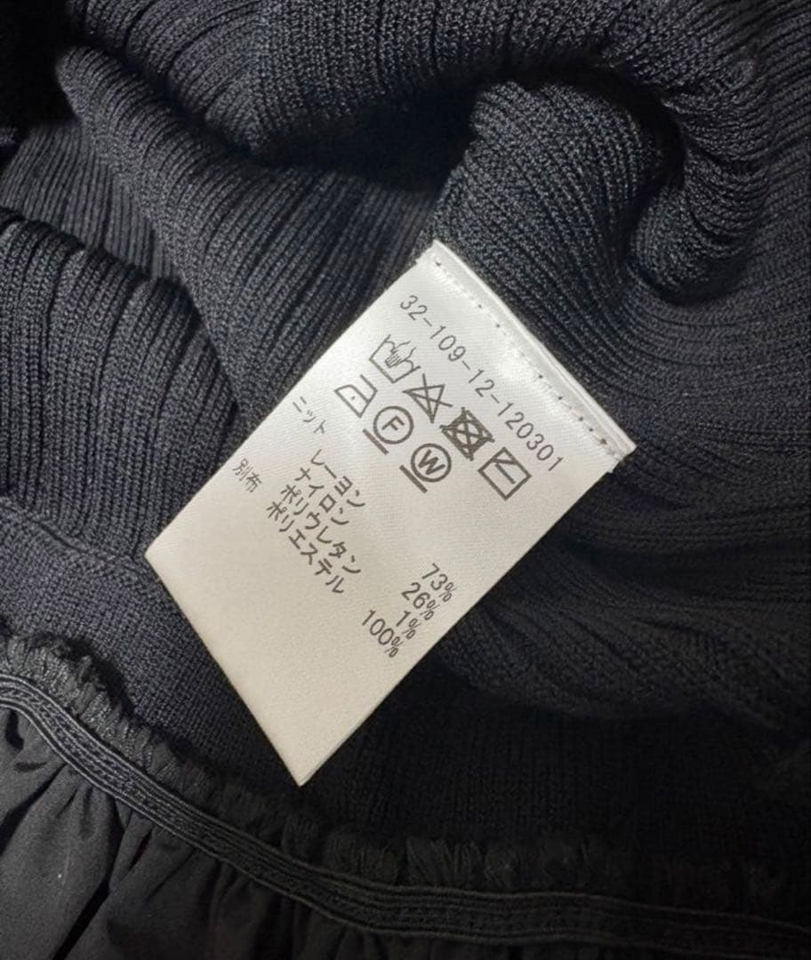 エストネーション　ブラック ペプラムトップス